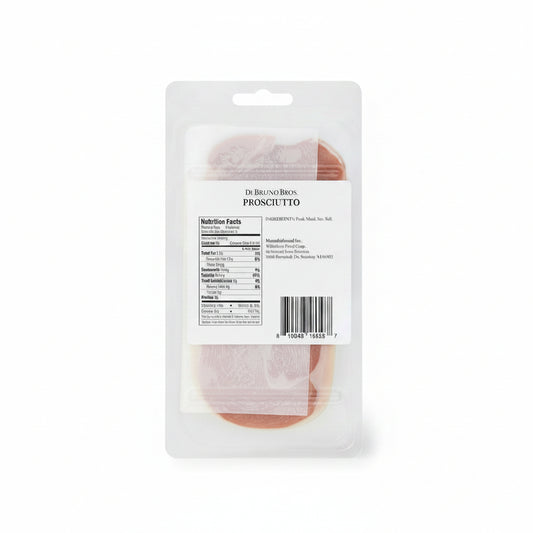 Packaged prosciutto with a label on a marble surface