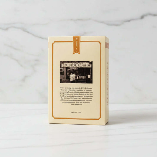 Biscotti box with branding and text on a black surface