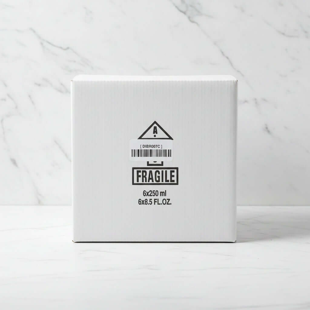 Cardboard box with a fragile label on a black surface
