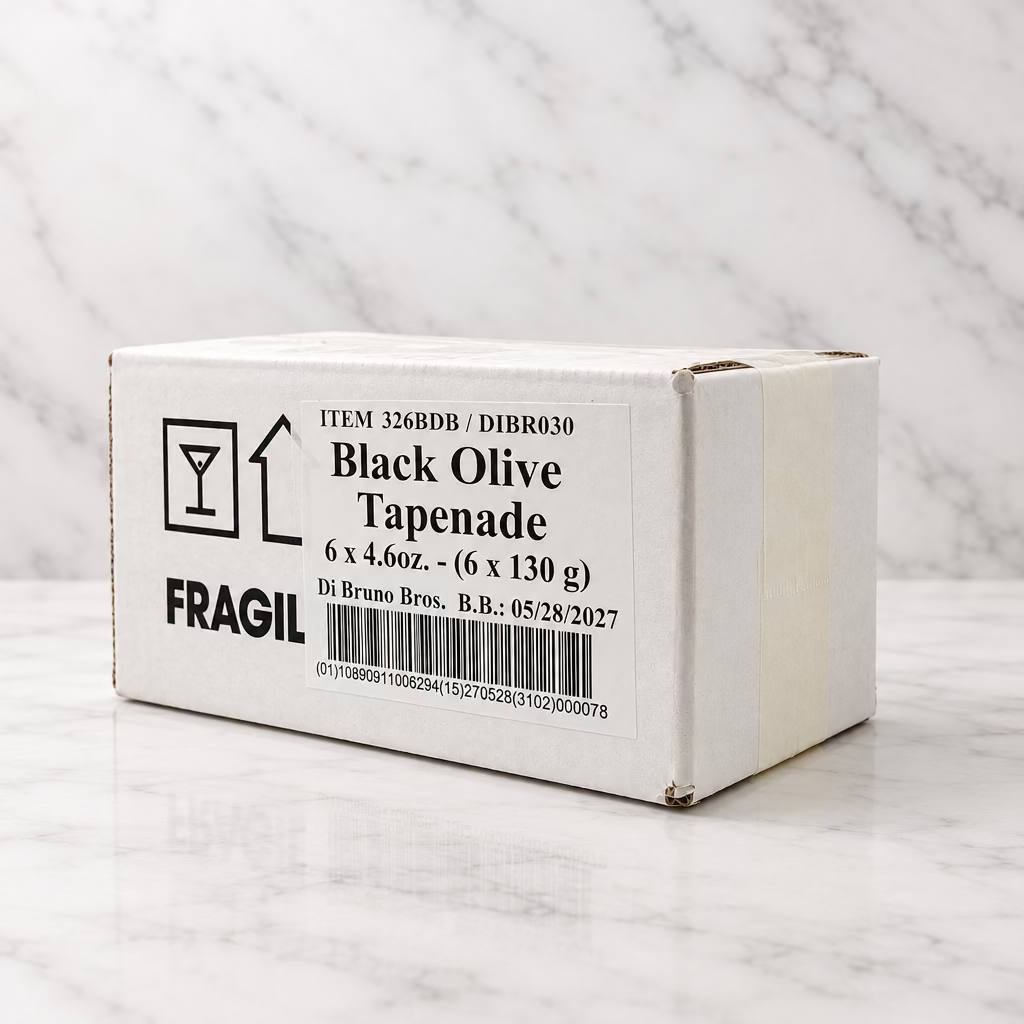 A white cardboard box of Di Bruna Bros. Black Olive Tapenade, showing the front and side labels, set against a plain light gray background.