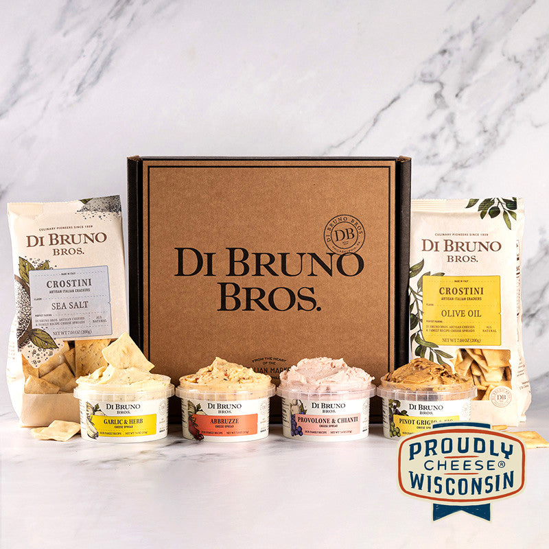 A gourmet gift box from Di Bruno Bros. containing four classic cheese spreads and two crostini varieties.