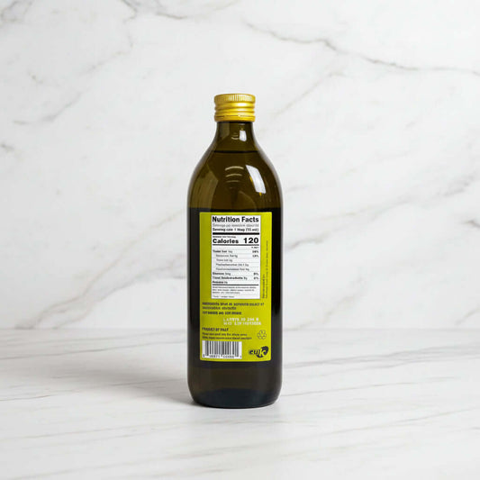 Bottle with a nutrition facts label on a dark surface