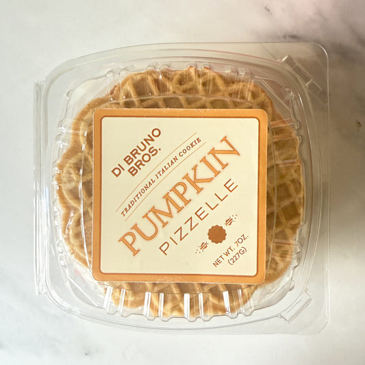 Packaged pumpkin pizzelle cookies with Di Bruno Bros. branding on a white background