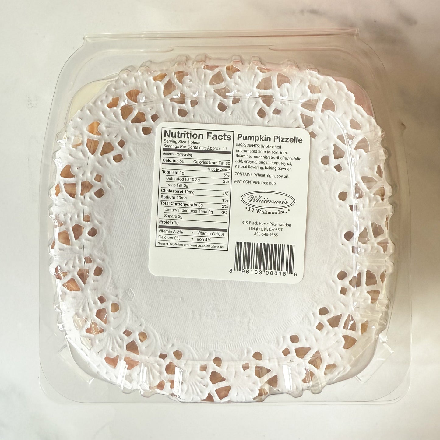 Packaged pumpkin puzzles with a label on a white background