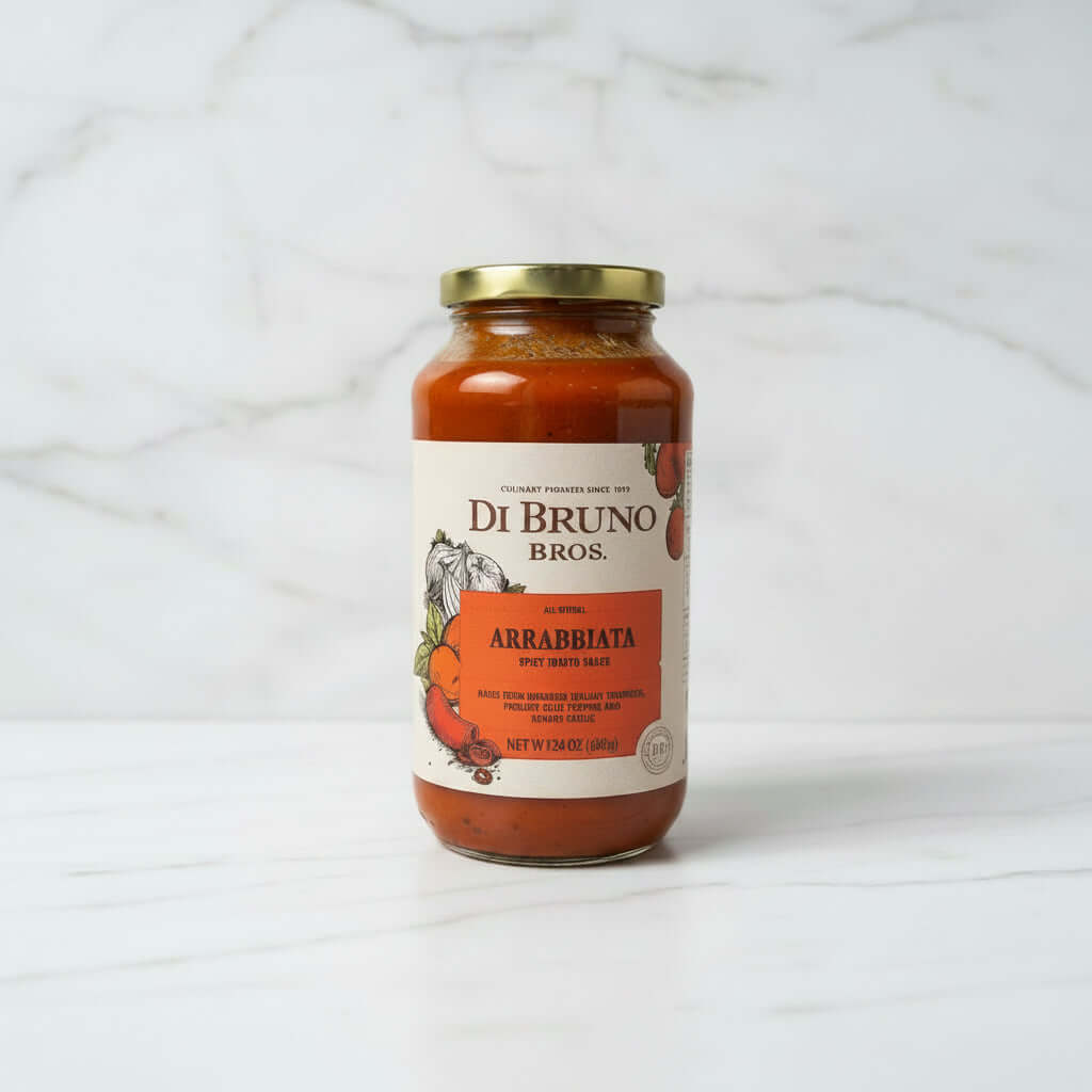 premium arrabbiata pasta sauce in a jar with a gold lid