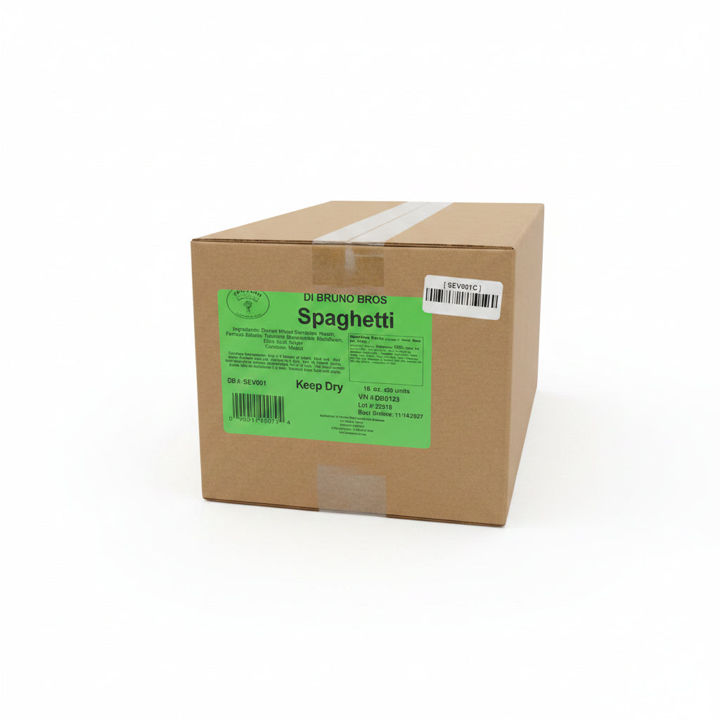 Cardboard box with a green label indicating 'Spaghetti' on a black surface.