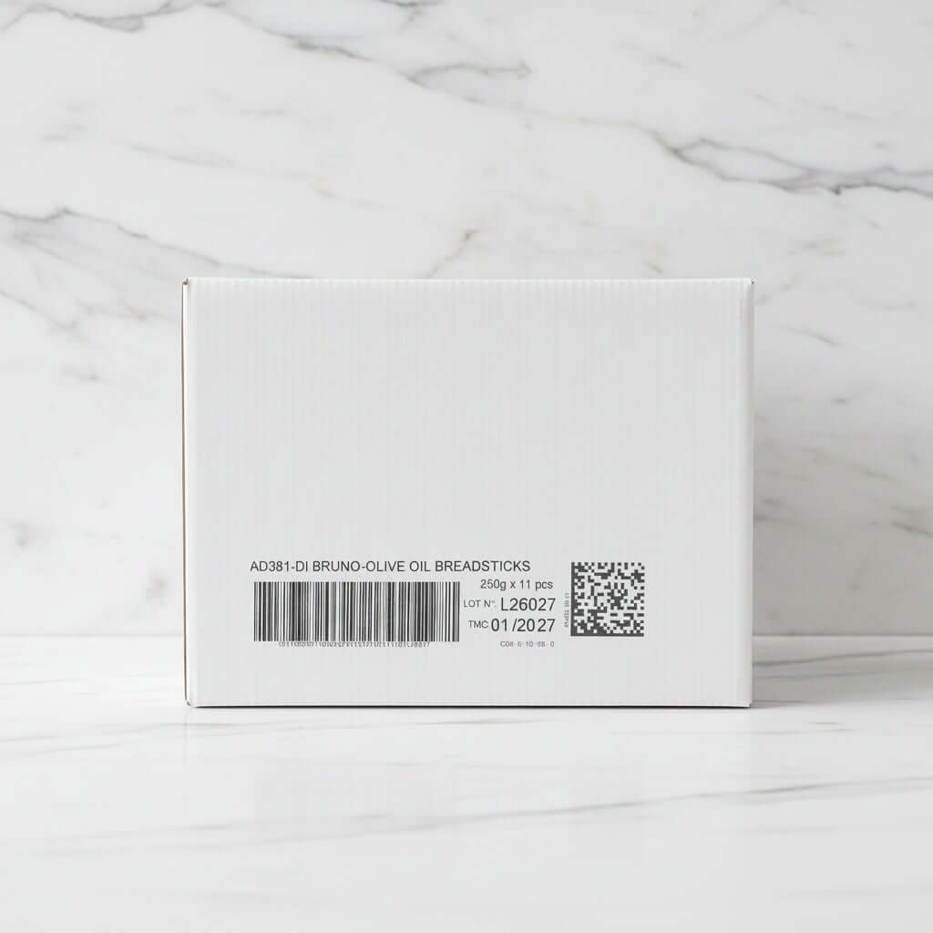Box with barcode and QR code in a warehouse setting
