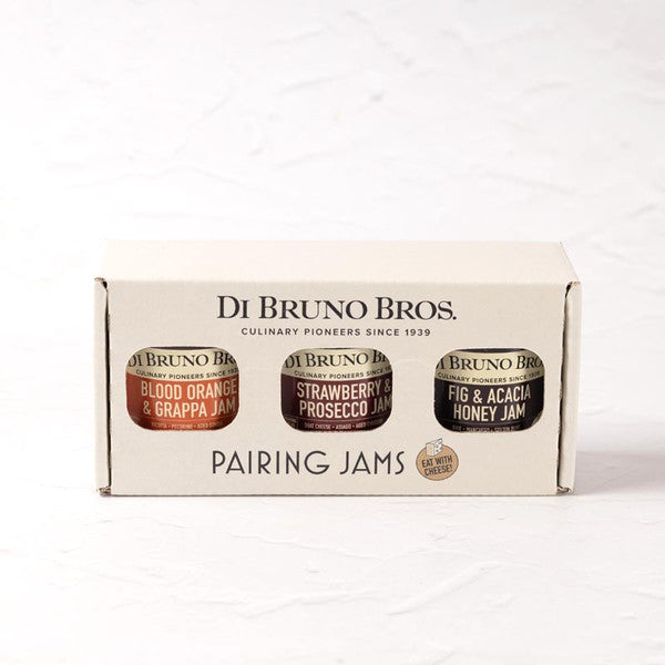 A box of Di Bruno Bros. pairing jams containing three jams; Strawberry Prosecco, Fig Acacia Honey, and Blood Orange Grappa.