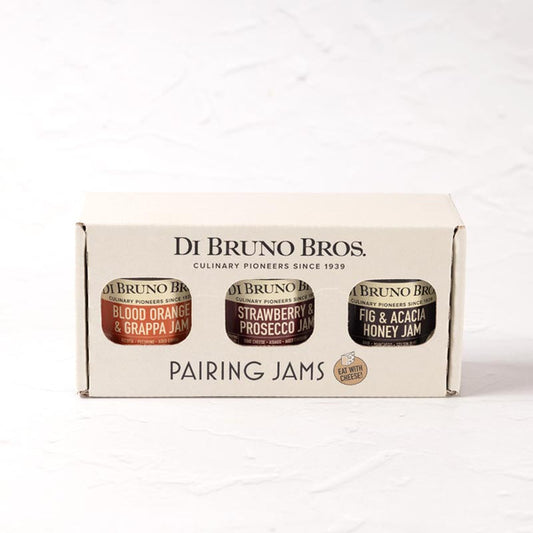 A box of Di Bruno Bros. pairing jams containing three jams; Strawberry Prosecco, Fig Acacia Honey, and Blood Orange Grappa.