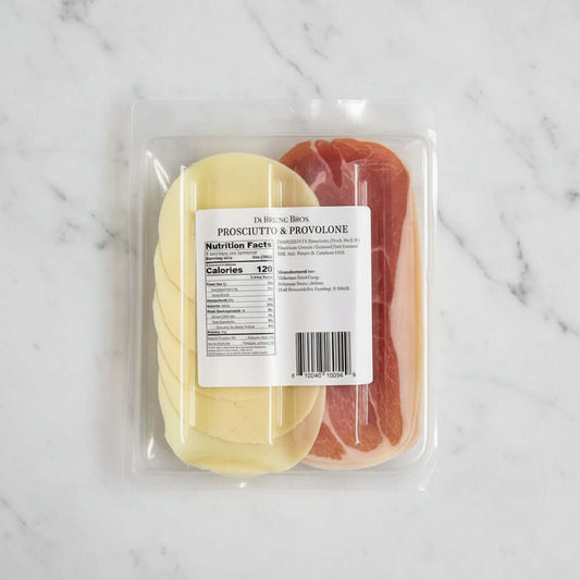 Packaged prosciutto and provolone cheese with a label on a black background