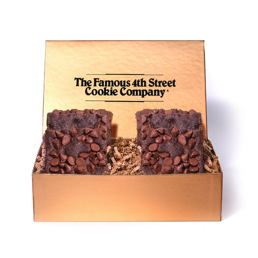 Two chocolate chip cookie bars in a box from The Famous 4th Street Cookie Company.