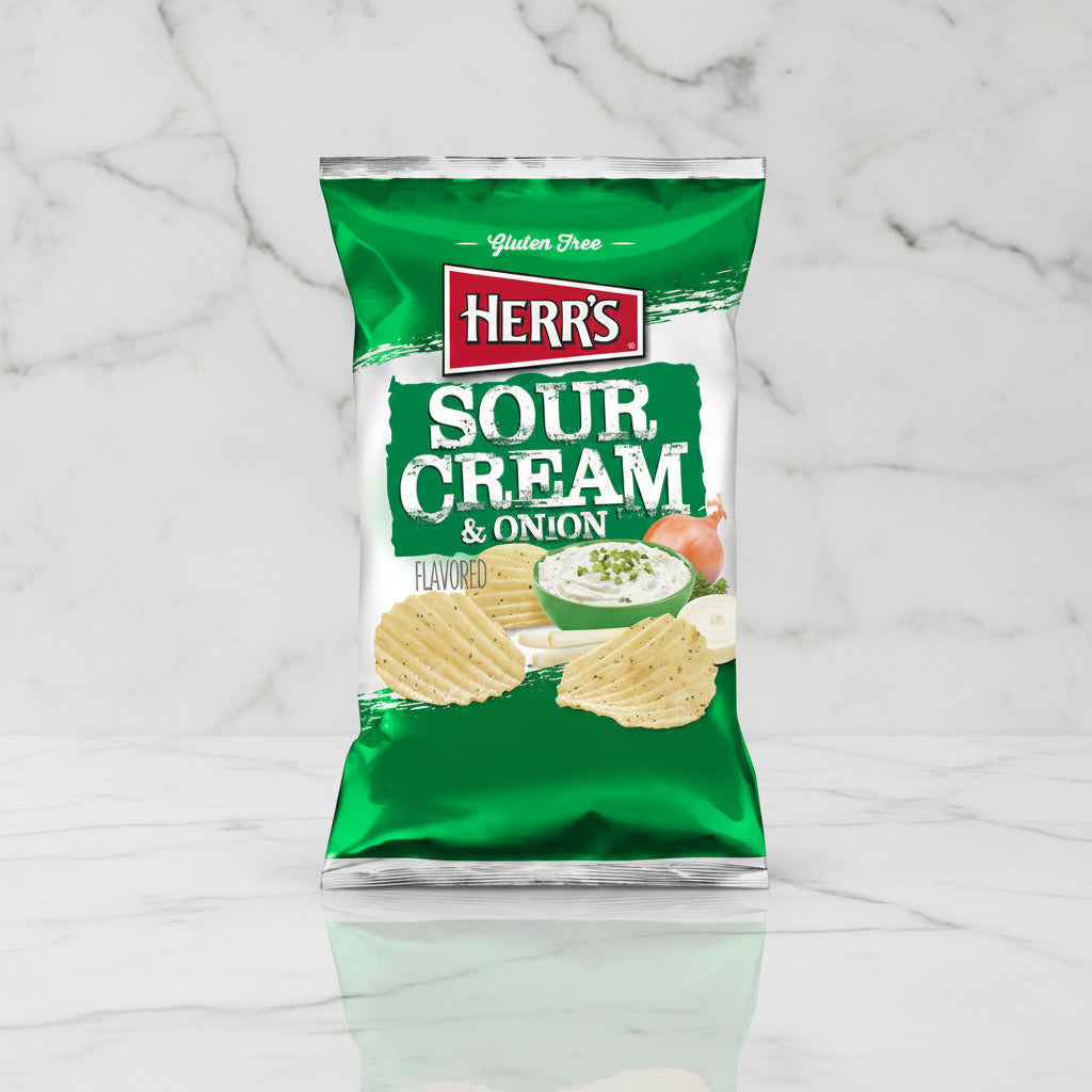 Green bag of Herr's Sour Cream & Onion flavored chips on a white background