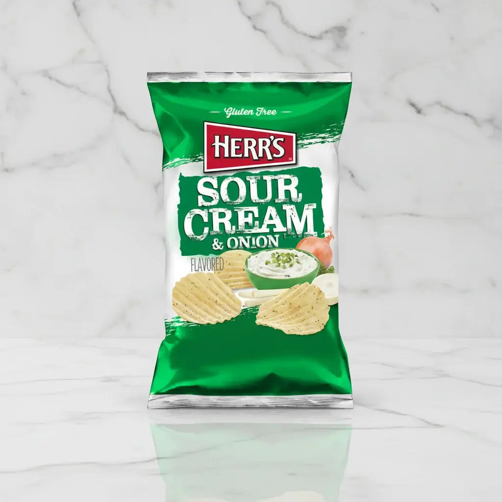 Green bag of Herr's Sour Cream & Onion flavored chips on a white background
