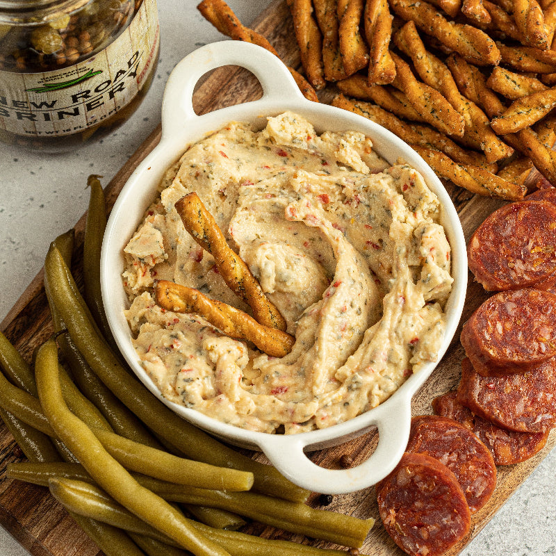 Port city pretzels dipped in Di Bruno Bros. iconic abbruzze cheese spread.