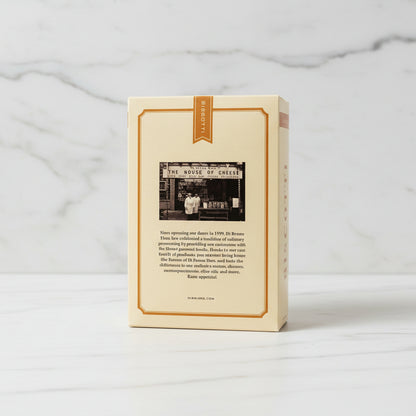 Biscotti box with branding and text on a black surface
