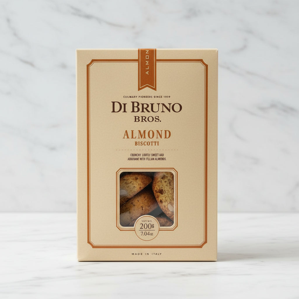 Di Bruno Bros almond biscotti packaging on a black surface with a white background