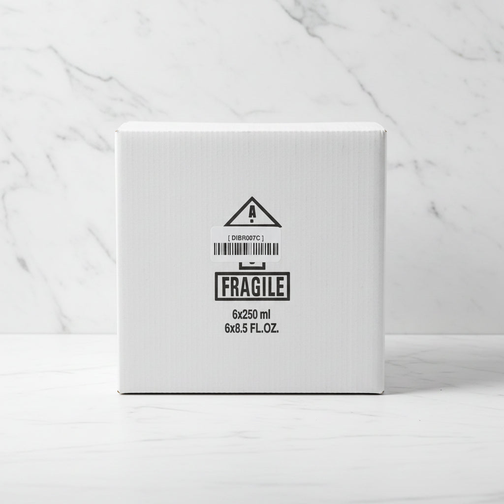 Cardboard box with a fragile label on a black surface