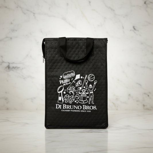 Assorted food products including bags, jars, and bowls on a marble surface with a branded black bag.