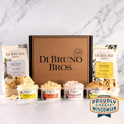 A gourmet gift box from Di Bruno Bros. containing four classic cheese spreads and two crostini varieties.