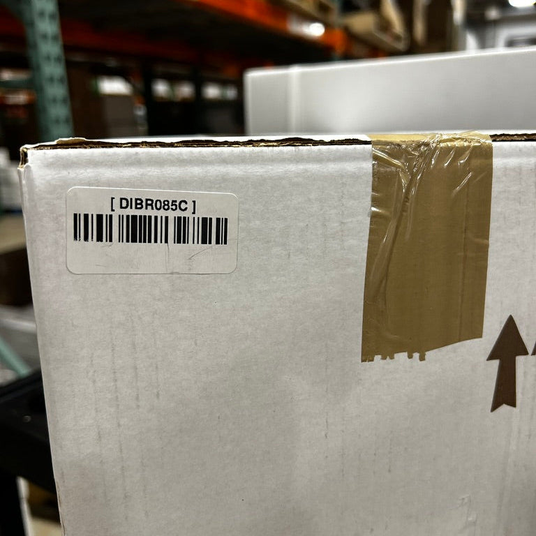 Cardboard box with a barcode label in a warehouse setting