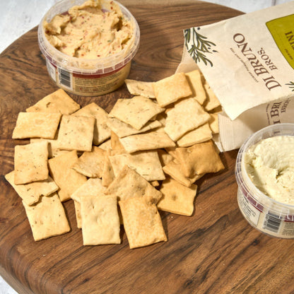Di Bruno Bros. Crostini crackers paired with two cheese spreads.