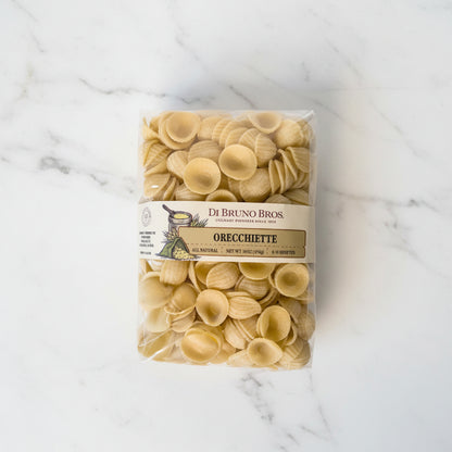 Packaged Di Bruno Bros. orecchiette pasta in a clear plastic bag.