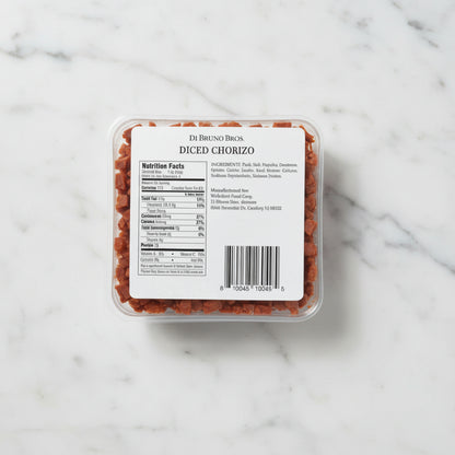 Packaged diced chorizo with a label on a gray background