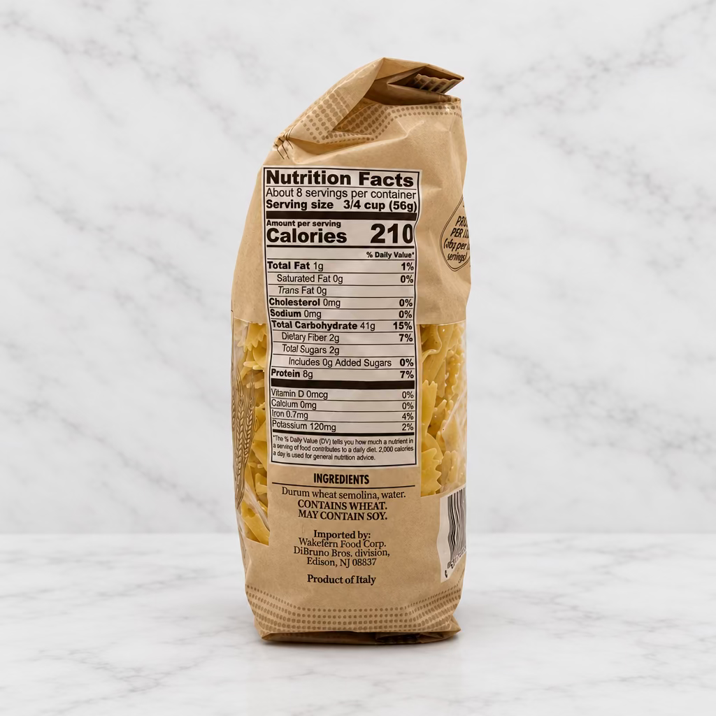 A bag of farfalle pasta shown from the back, displaying the nutrition facts panel and ingredients list against a plain white background.