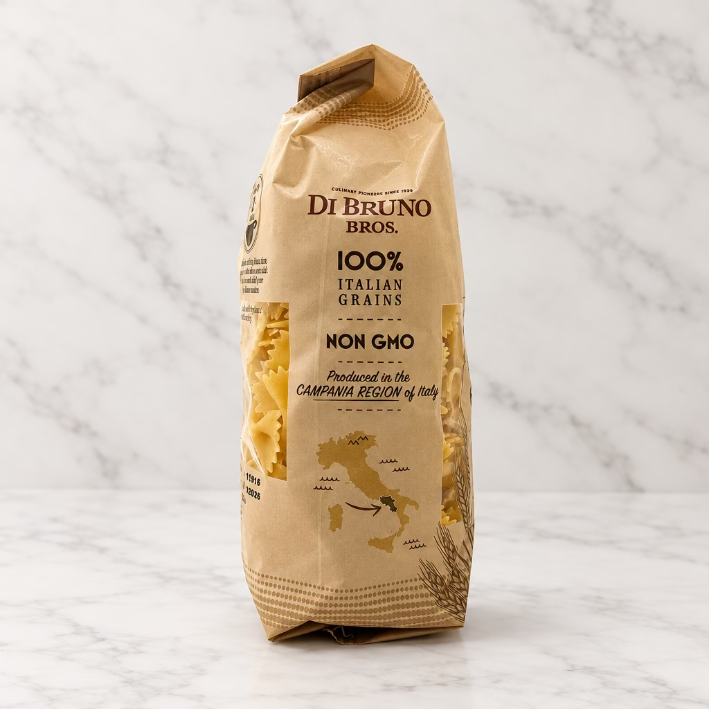 A bag of Di Bruno Bros. 100% Italian Grains Non Gho pasta, shown standing upright against a plain white studio background.