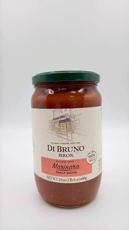 A 24 oz glass jar of Di Bruno Bros. Marinara sauce with a dark green lid and a cream-colored label, set against a plain light gray background.