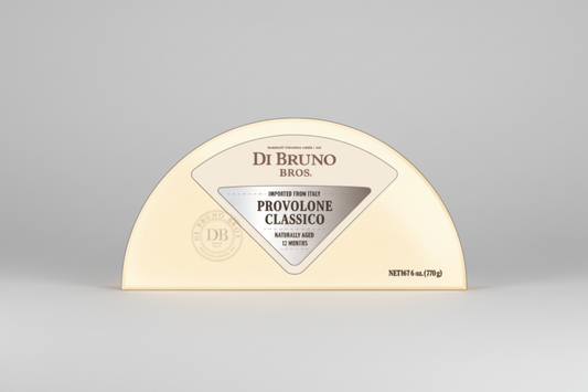 Di Bruno Bros Provolone Classico cheese wheel on a white background