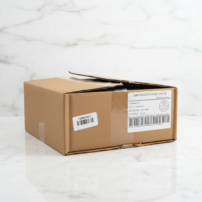 Cardboard box with labels on a white marble surface
