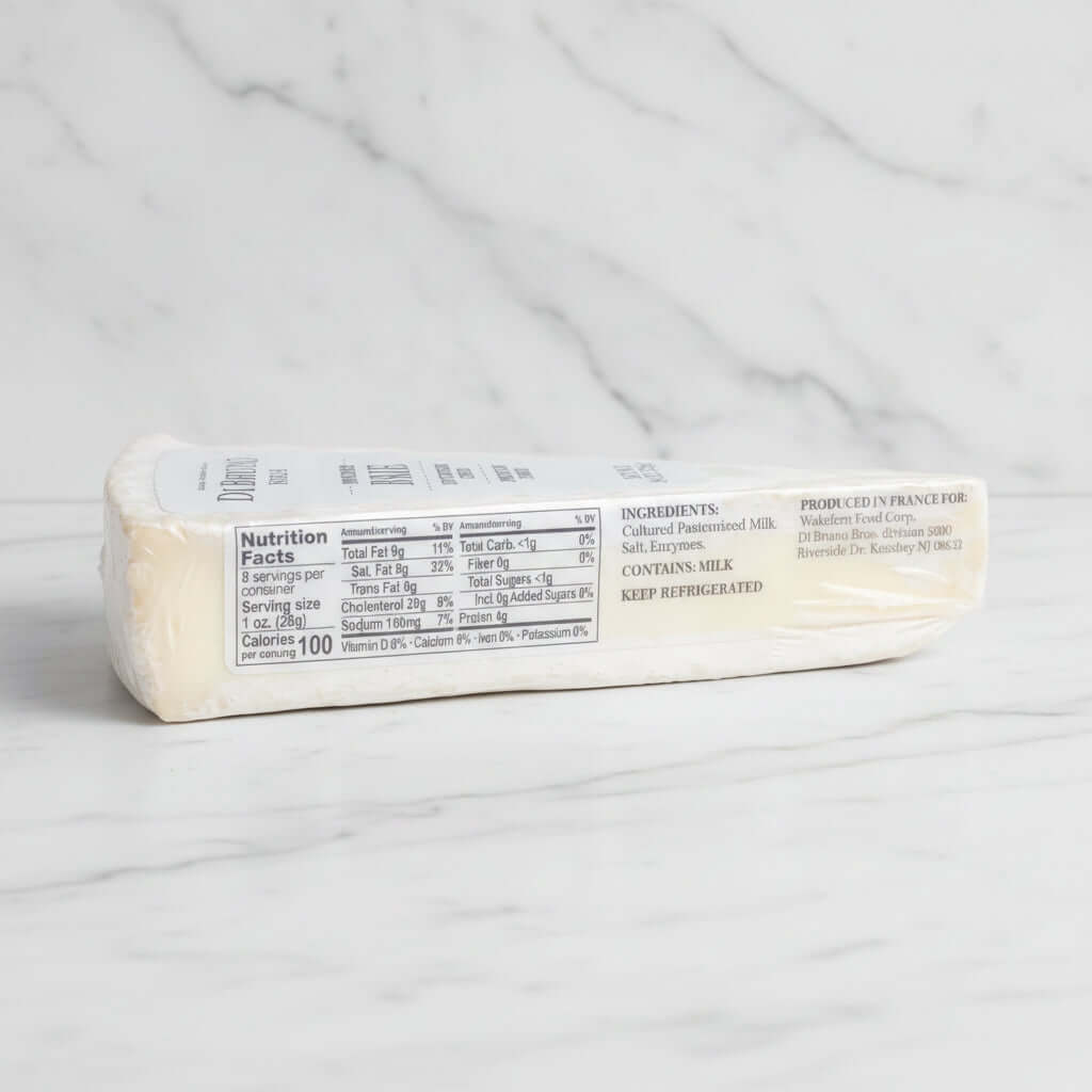 A wedge of Di Bruno Brie cheese on a white background with a small printed number below it.