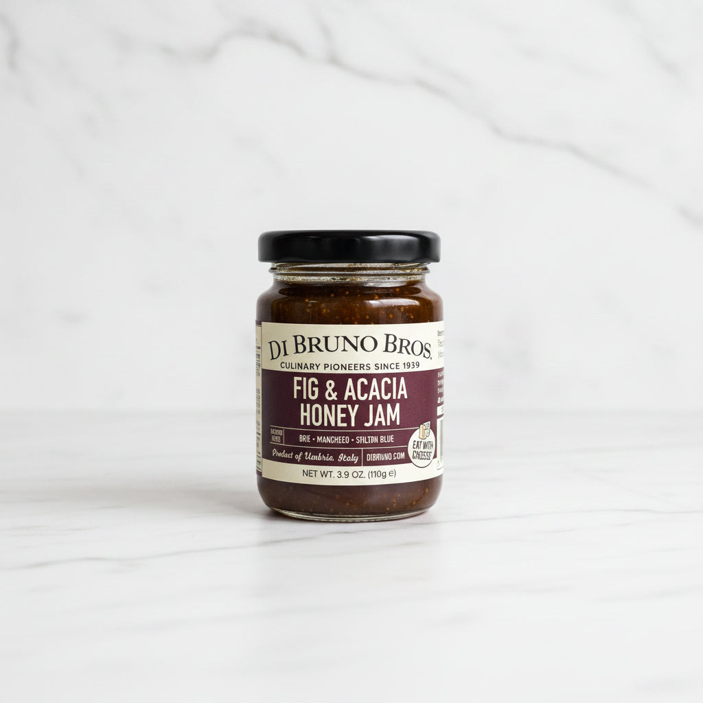 Jar of Di Bruno Bros Fig & Acacia Honey Jam on a kitchen counter