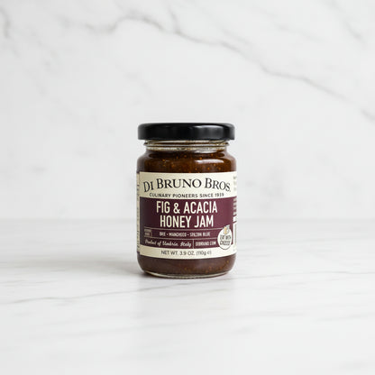 Jar of Di Bruno Bros Fig & Acacia Honey Jam on a kitchen counter