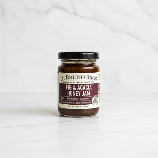 Jar of Di Bruno Bros Fig & Acacia Honey Jam on a kitchen counter