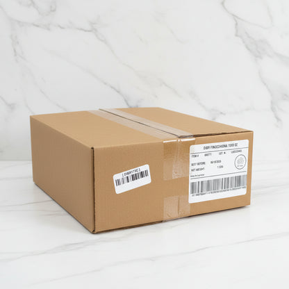 Cardboard box with labels in a warehouse setting