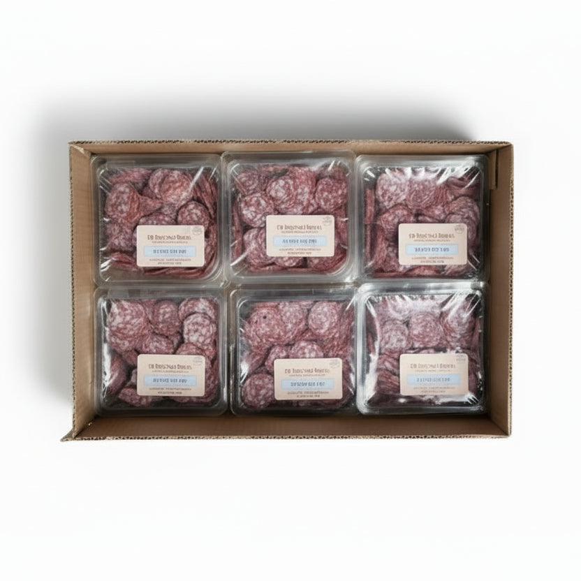 Box of packaged red meat with labels on a concrete floor
