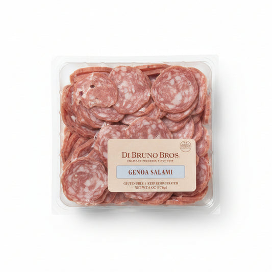 Packaged Genoa Salami with Di Bruno Bros label on a gray background