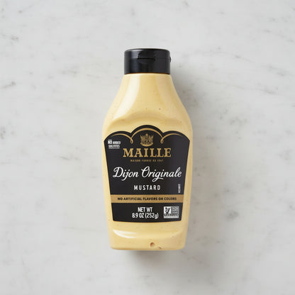 Maille Dijon Originale Mustard bottle on a white background