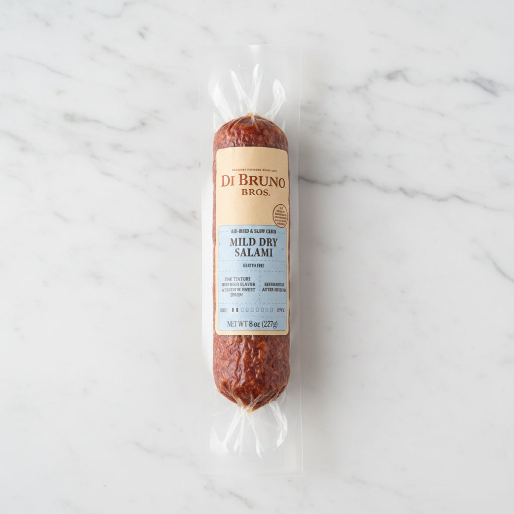 Packaged salami with Di Bruno Bros label on a dark surface