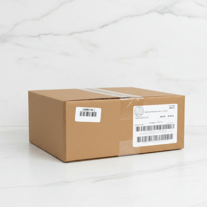 Cardboard box with labels in a warehouse setting