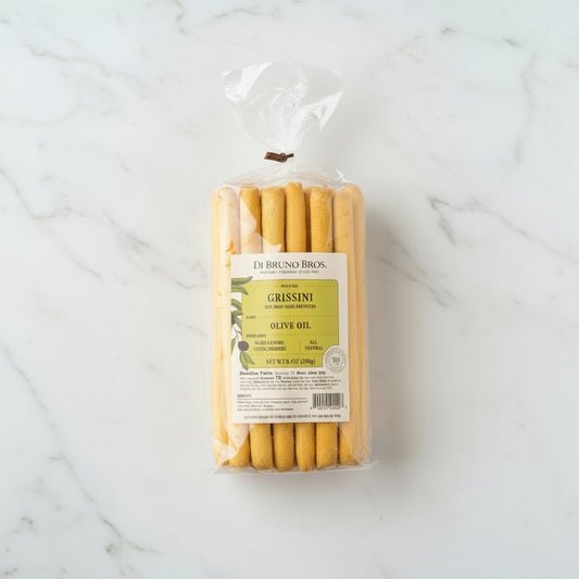 Packaged grissini with olive oil flavor on a warehouse shelf