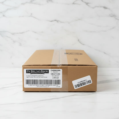Cardboard box with Di Bruno Bros label on a reflective surface