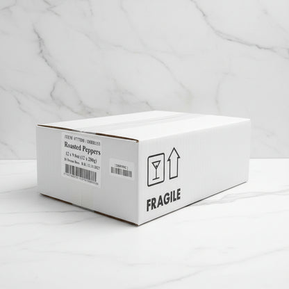 White cardboard box labeled 'Roasted Peppers' with a fragile icon on a black surface.