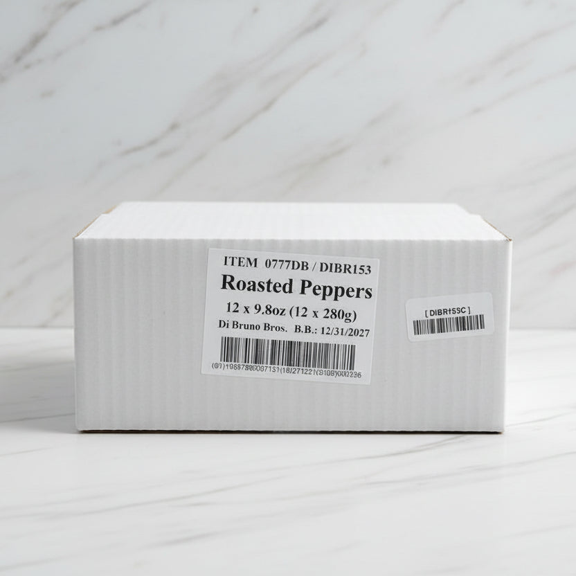 Box of roasted peppers in a warehouse setting