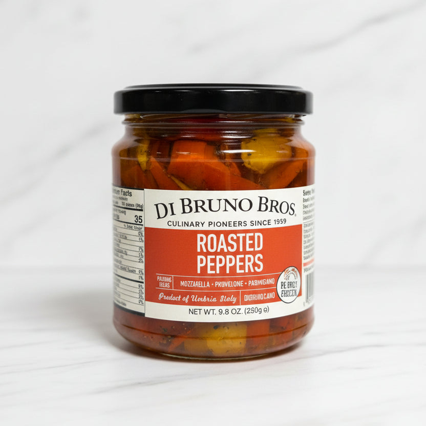 Jar of Di Bruno Bros roasted peppers on a kitchen counter