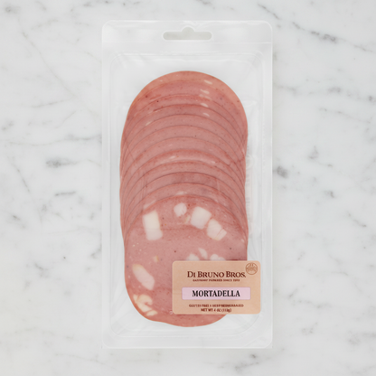 Packaged mortadella sausage in a clear plastic wrap with visible branding.