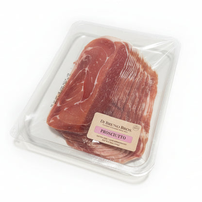 Packaged prosciutto with a label on a white surface