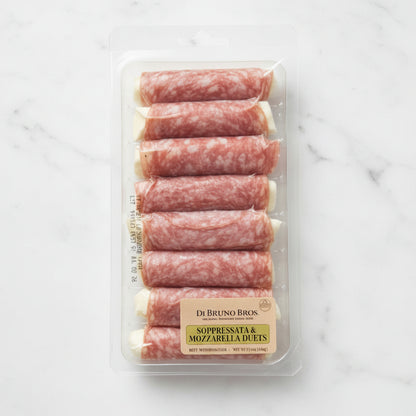 Packaged sausages on a white card with a brown background